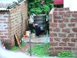 Watch this two hot Sri Lankan lady getting bath in outdoor