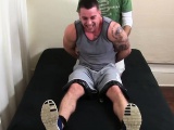 Sexy tattooed and muscular hunk getting tied up and tickled